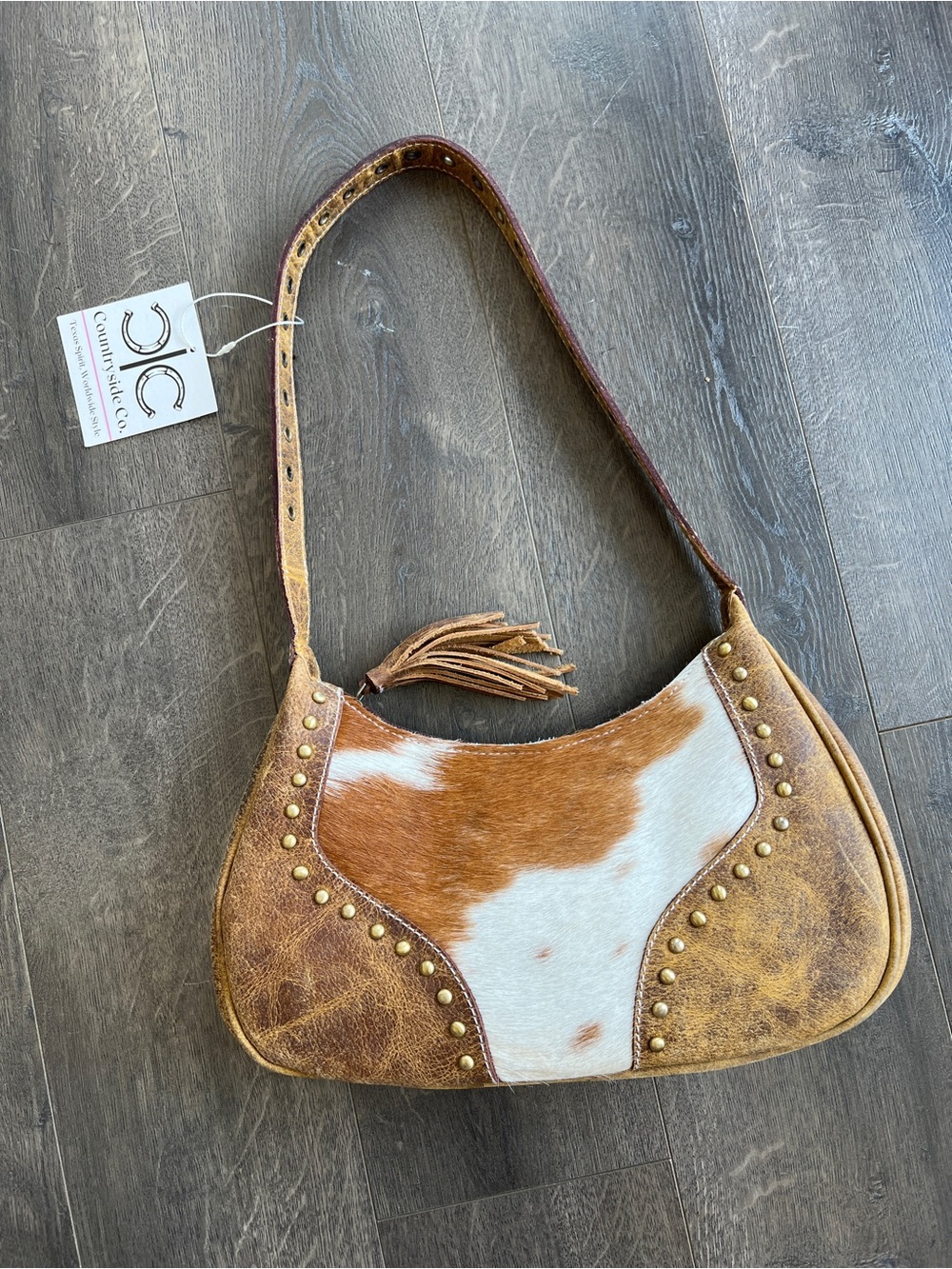Cowhide Studded Shoulder Bag in Brown & White by